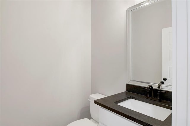 916 Mccay Ave, Mobile, AL 36609 - half bathroom featuring vanity and toilet