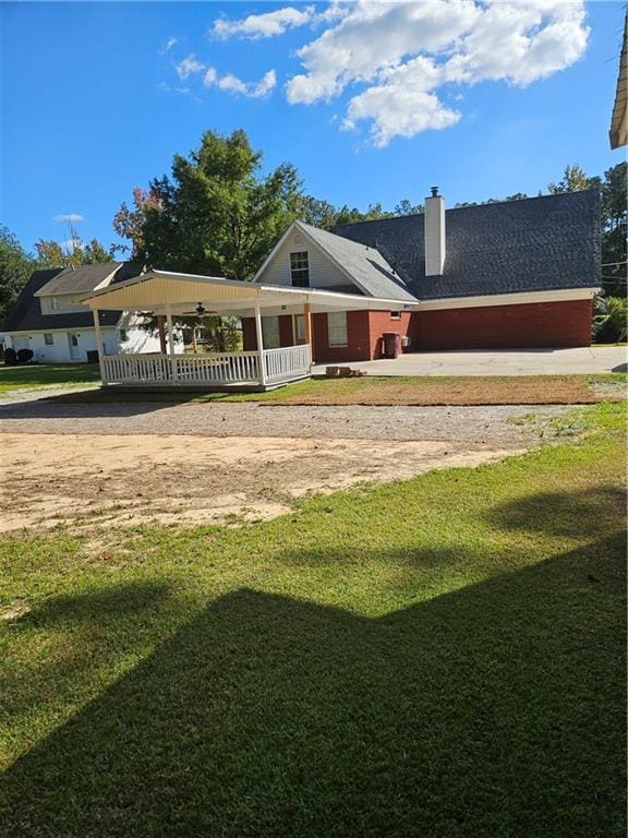 exterior space with a front lawn