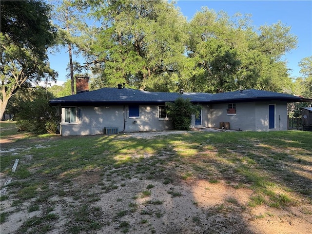 1137 Forest Ave, Saraland, AL 36571 - rear view of house featuring a lawn and a chimney