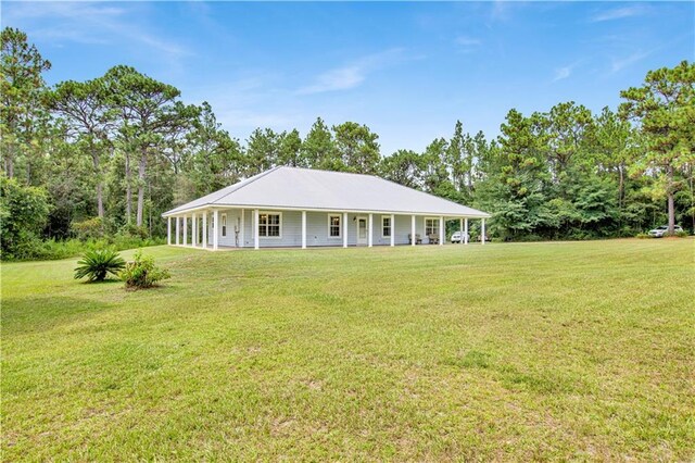 exterior space featuring a front yard and a porch