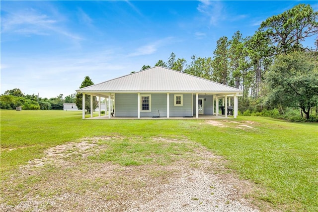 farmhouse-style home with a porch and a front yard