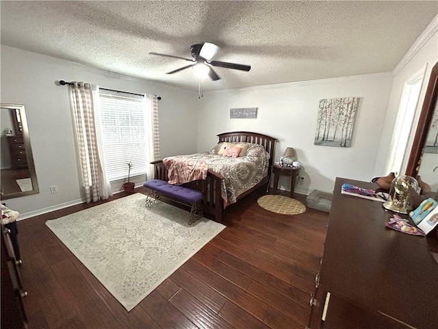 bedroom featuring a textured ceiling, dark hardwood / wood-style floors, and ceiling fan