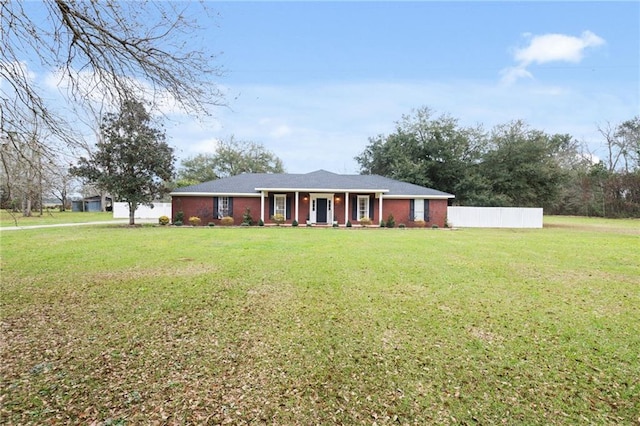 single story home featuring a porch, a front yard, and fence