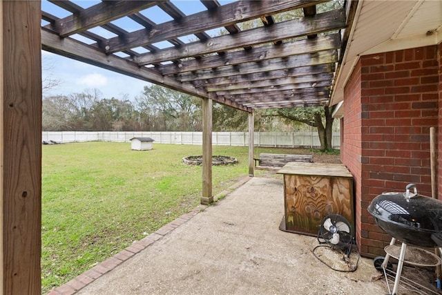 view of patio featuring a fenced backyard, a grill, and a pergola