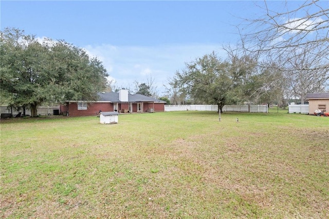 view of yard with fence