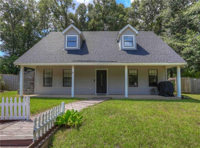 view of front of property with a front lawn