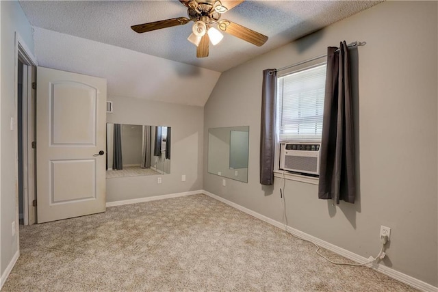 128 Richmond Rd, Daphne, AL 36526 - unfurnished room with vaulted ceiling, a textured ceiling, baseboards, ceiling fan, and carpet