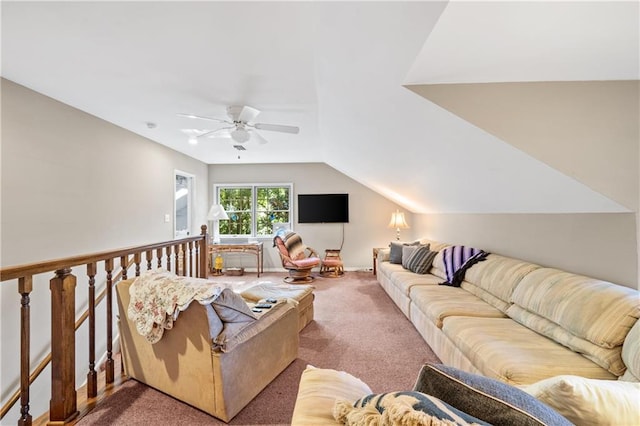 living room with carpet floors, lofted ceiling, and ceiling fan