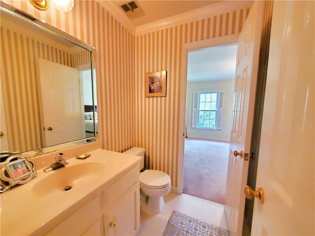 bathroom featuring vanity, visible vents, wallpapered walls, crown molding, and toilet