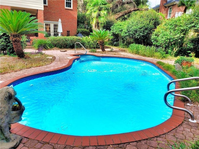 pool with french doors