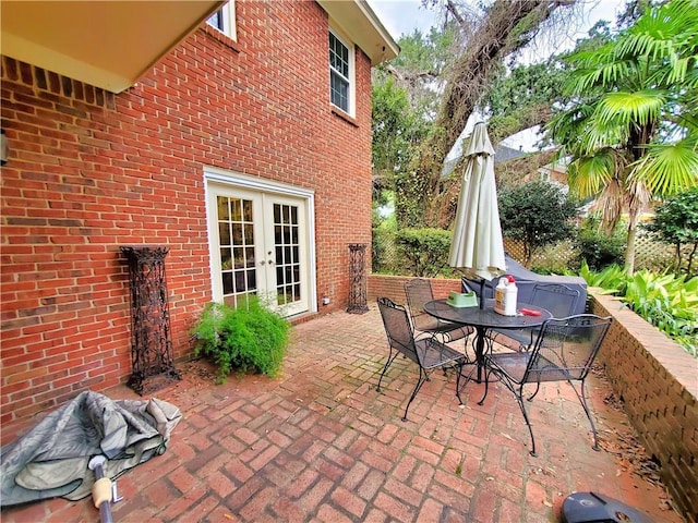 view of patio featuring french doors and outdoor dining space