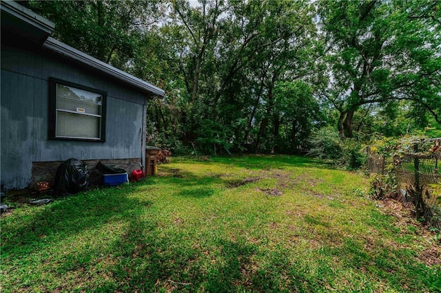 view of yard with fence