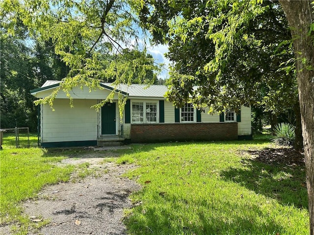 2365 Dog River Dr N, Mobile, AL 36605 - view of front of house featuring entry steps and a metal roof