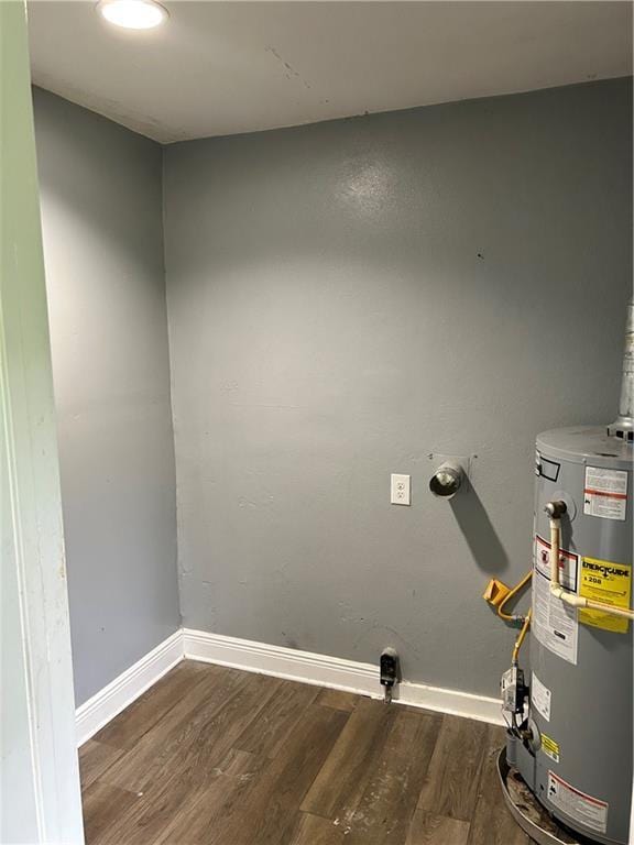 2365 Dog River Dr N, Mobile, AL 36605 - laundry room featuring gas water heater and wood finished floors