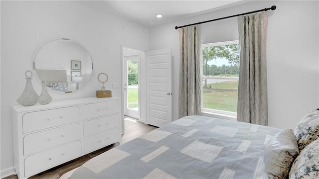 bedroom with wood finished floors