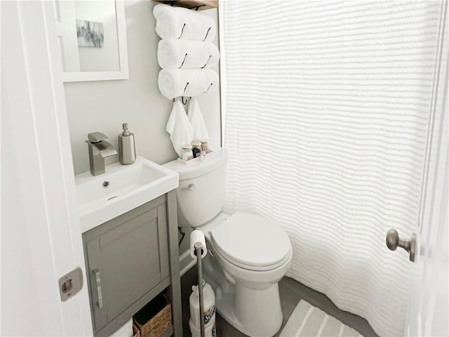 bathroom with vanity and toilet