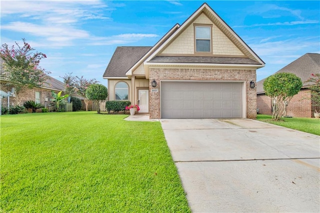 view of front of house featuring a garage and a front yard