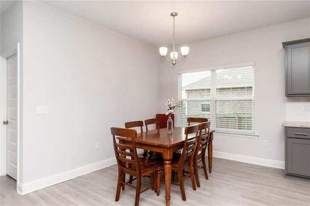12927 Sanderling Loop, Daphne, AL 36527 - dining room featuring light wood-type flooring and a chandelier