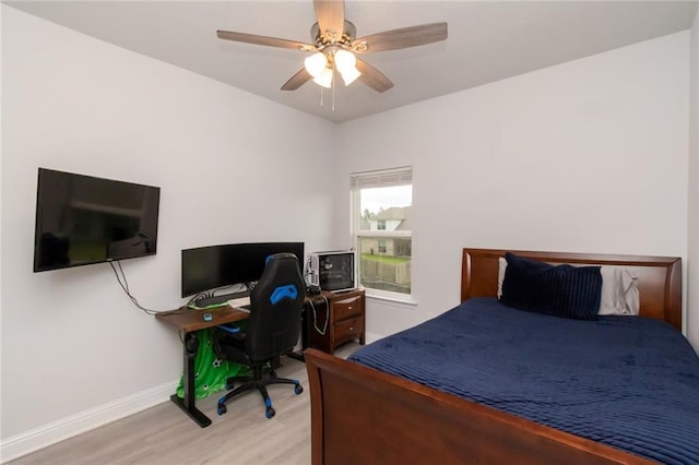 12927 Sanderling Loop, Daphne, AL 36527 - bedroom featuring wood finished floors, a ceiling fan, and an office area