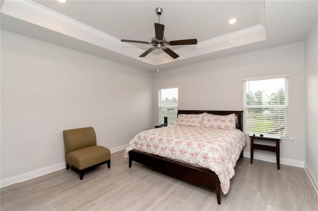 12927 Sanderling Loop, Daphne, AL 36527 - bedroom featuring a tray ceiling, light wood finished floors, ornamental molding, recessed lighting, and a ceiling fan