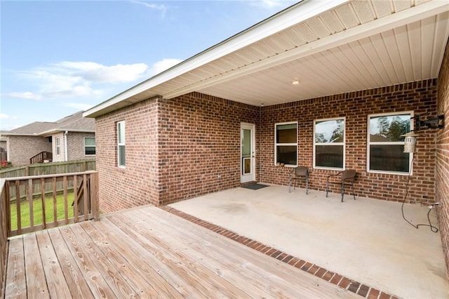 12927 Sanderling Loop, Daphne, AL 36527 - wooden deck with a patio area
