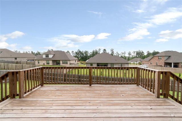 12927 Sanderling Loop, Daphne, AL 36527 - wooden terrace featuring a residential view and a fenced backyard