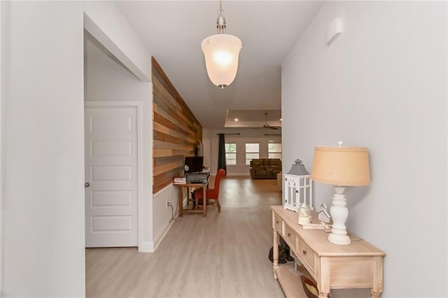 12927 Sanderling Loop, Daphne, AL 36527 - corridor with wood walls and light wood-style flooring