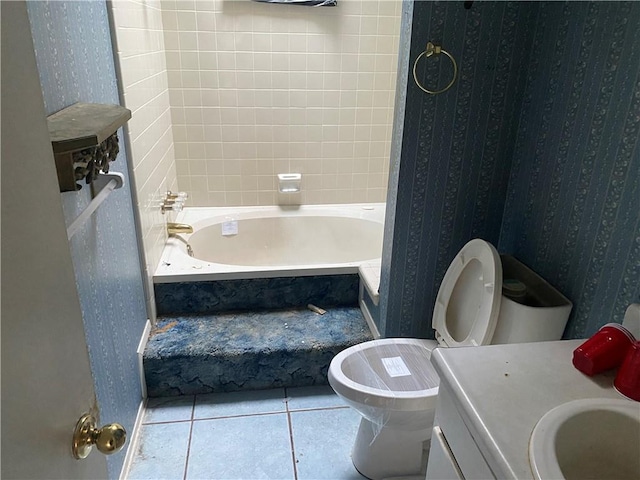 full bathroom featuring vanity, tile patterned floors, toilet, and bathtub / shower combination