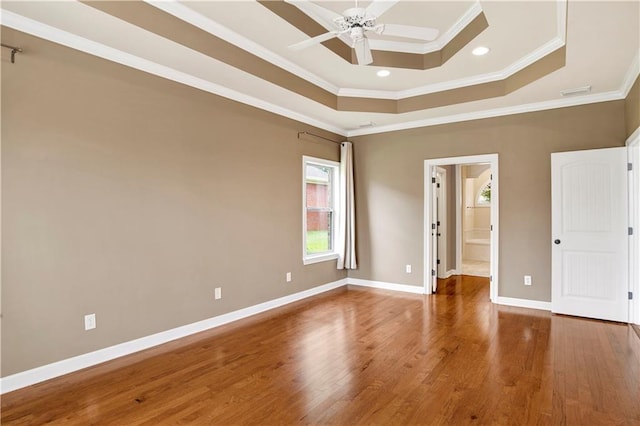 3245 Mcrae Dr, Mobile, AL 36695 - unfurnished bedroom featuring ornamental molding, a raised ceiling, wood finished floors, recessed lighting, and ensuite bathroom