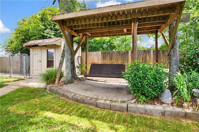 3245 Mcrae Dr, Mobile, AL 36695 - view of yard with a storage unit and a gate