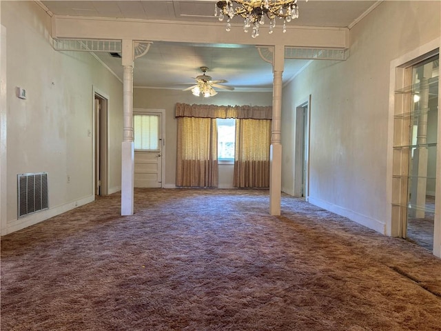 carpeted spare room with ornamental molding and ceiling fan with notable chandelier