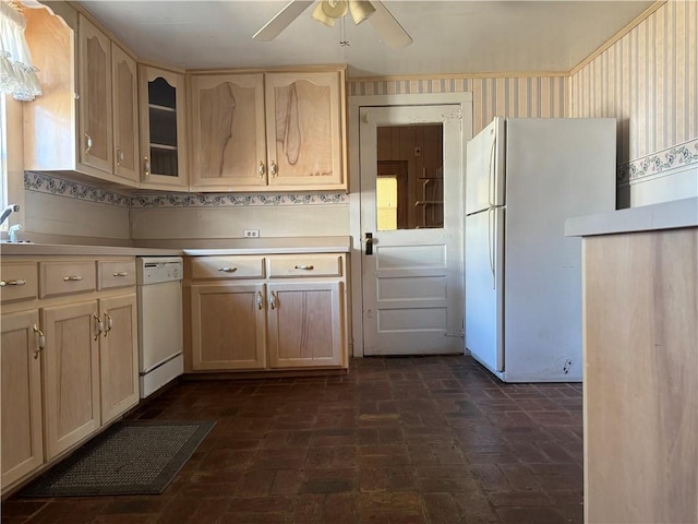 kitchen with white appliances, ceiling fan, and light brown cabinetry