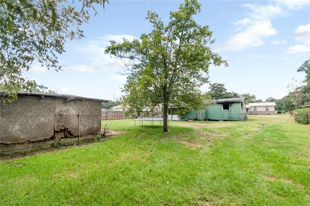 view of yard featuring a trampoline