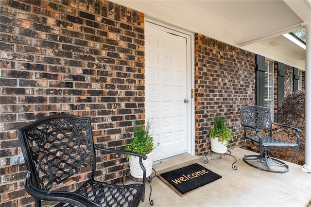 entrance to property with covered porch