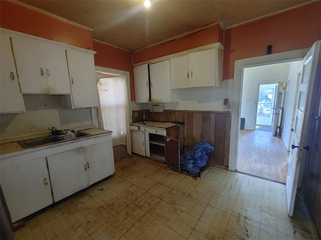 kitchen with sink and white cabinets