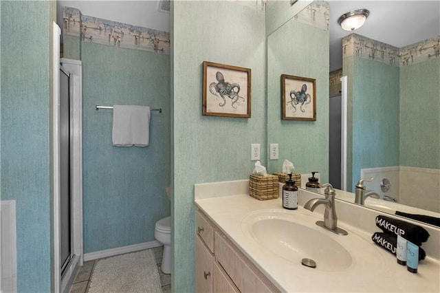 50 Forney Johnston Dr Unit 8B, Dauphin Island, AL 36528 - full bath with vanity, toilet, a shower stall, and tile patterned flooring