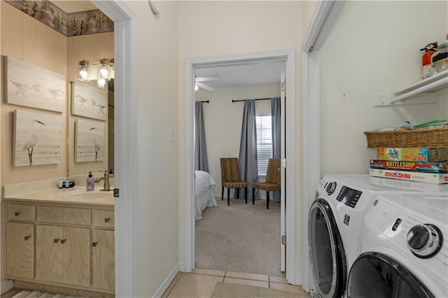 50 Forney Johnston Dr Unit 8B, Dauphin Island, AL 36528 - laundry area featuring washing machine and clothes dryer, light colored carpet, and light tile patterned flooring