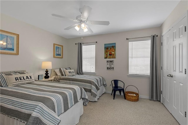 50 Forney Johnston Dr Unit 8B, Dauphin Island, AL 36528 - carpeted bedroom with a closet, baseboards, and ceiling fan