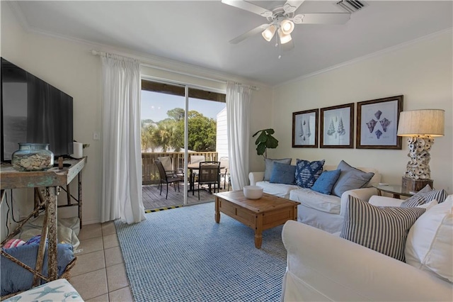 50 Forney Johnston Dr Unit 8B, Dauphin Island, AL 36528 - living room with crown molding, ceiling fan, and light tile patterned flooring