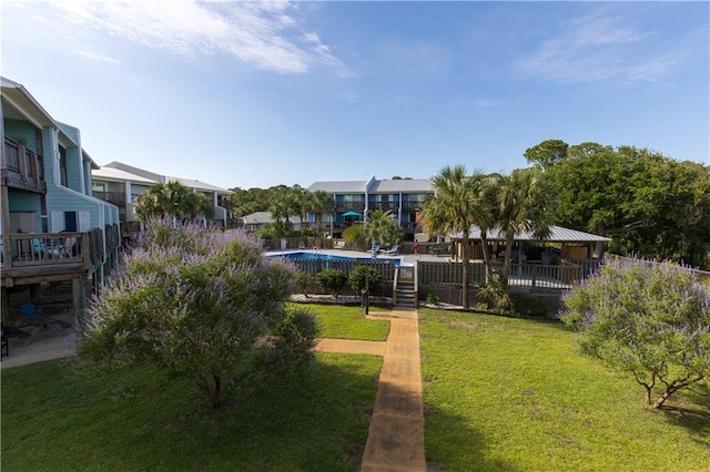 50 Forney Johnston Dr Unit 8B, Dauphin Island, AL 36528 - view of community with a yard and a swimming pool