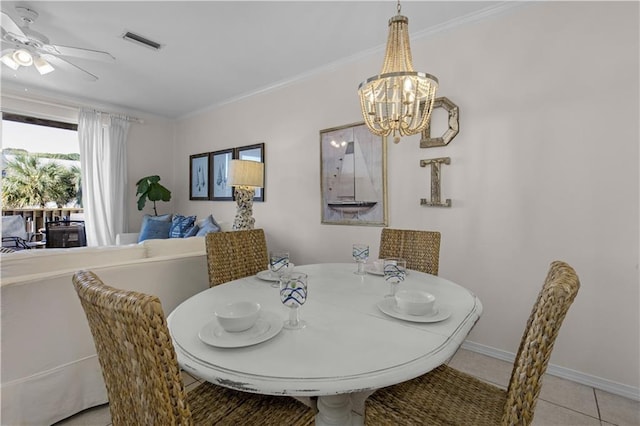 50 Forney Johnston Dr Unit 8B, Dauphin Island, AL 36528 - dining room featuring a chandelier, ornamental molding, light tile patterned floors, ceiling fan, and baseboards