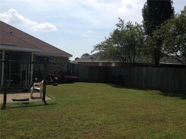 view of yard featuring a fenced backyard