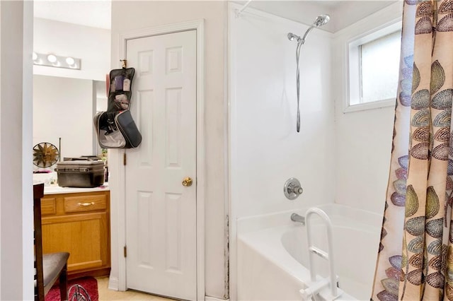 full bathroom featuring shower / tub combo with curtain and vanity