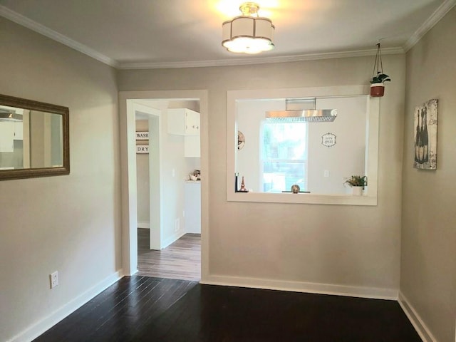 165 Stephens St, Mobile, AL 36606 - unfurnished dining area featuring dark wood finished floors, ornamental molding, and baseboards