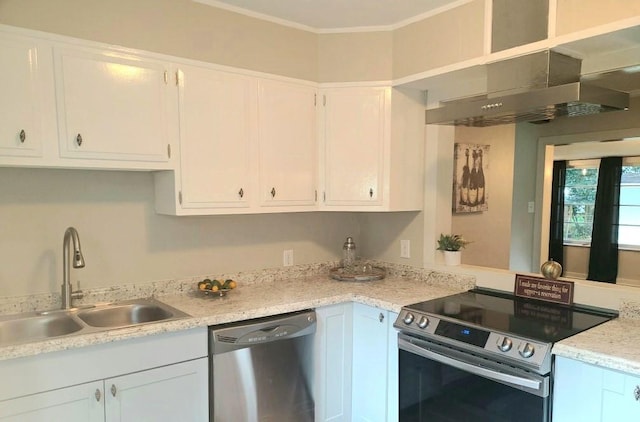 165 Stephens St, Mobile, AL 36606 - kitchen with stainless steel appliances, a sink, white cabinets, ornamental molding, and extractor fan