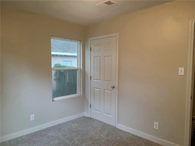 165 Stephens St, Mobile, AL 36606 - carpeted spare room featuring baseboards
