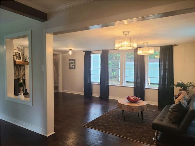 165 Stephens St, Mobile, AL 36606 - dining area featuring baseboards, hardwood / wood-style flooring, ornamental molding, and a chandelier