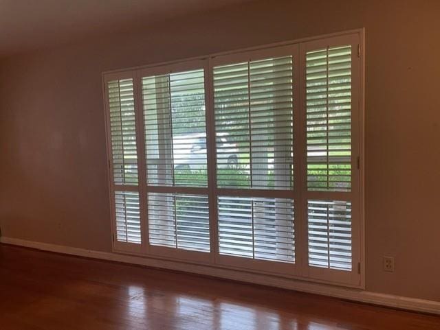 interior details featuring hardwood / wood-style flooring