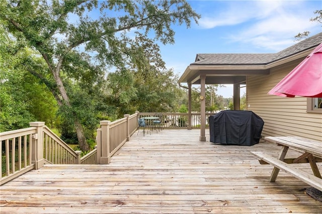 wooden deck with area for grilling