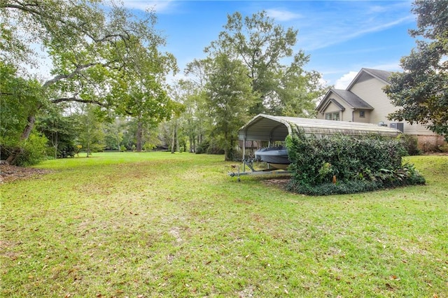 view of yard featuring a carport